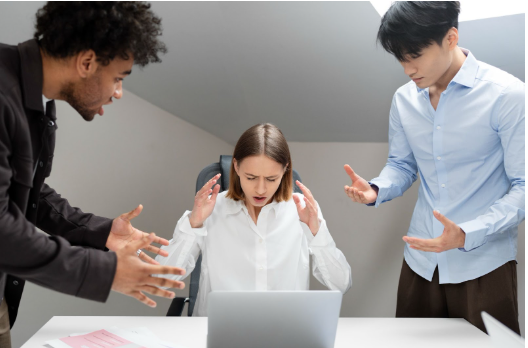 a female employee getting stressed and facing workplace harassment